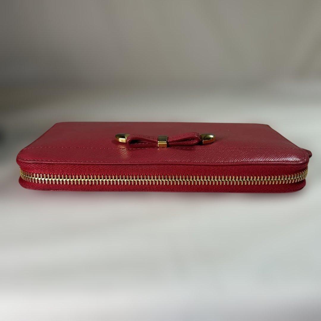 【sk/7.20/30】PRADA ピンク 二つ折り財布 リボン付き