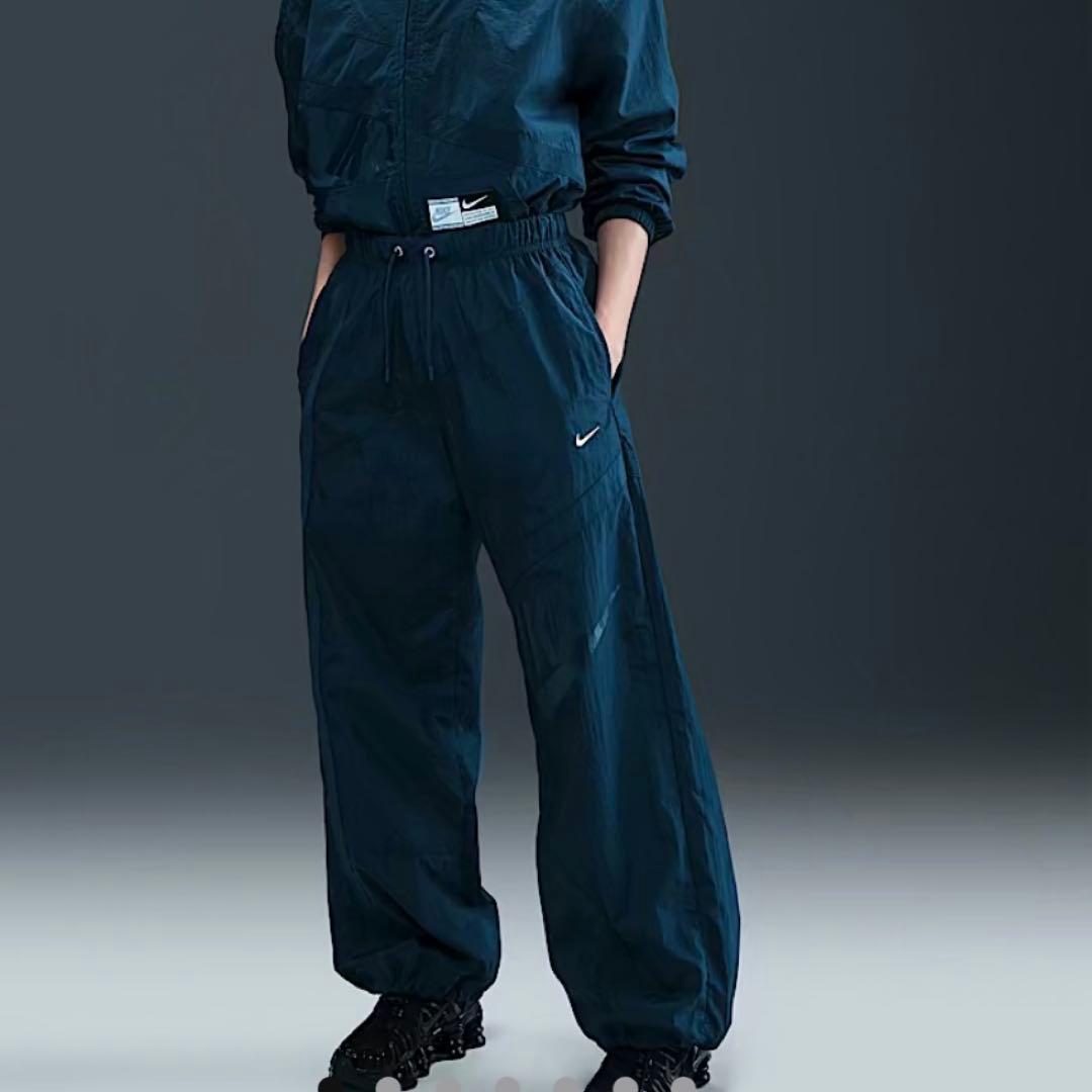 NIKE アーモリーネイビー オープンヘムパンツ - メルカリ