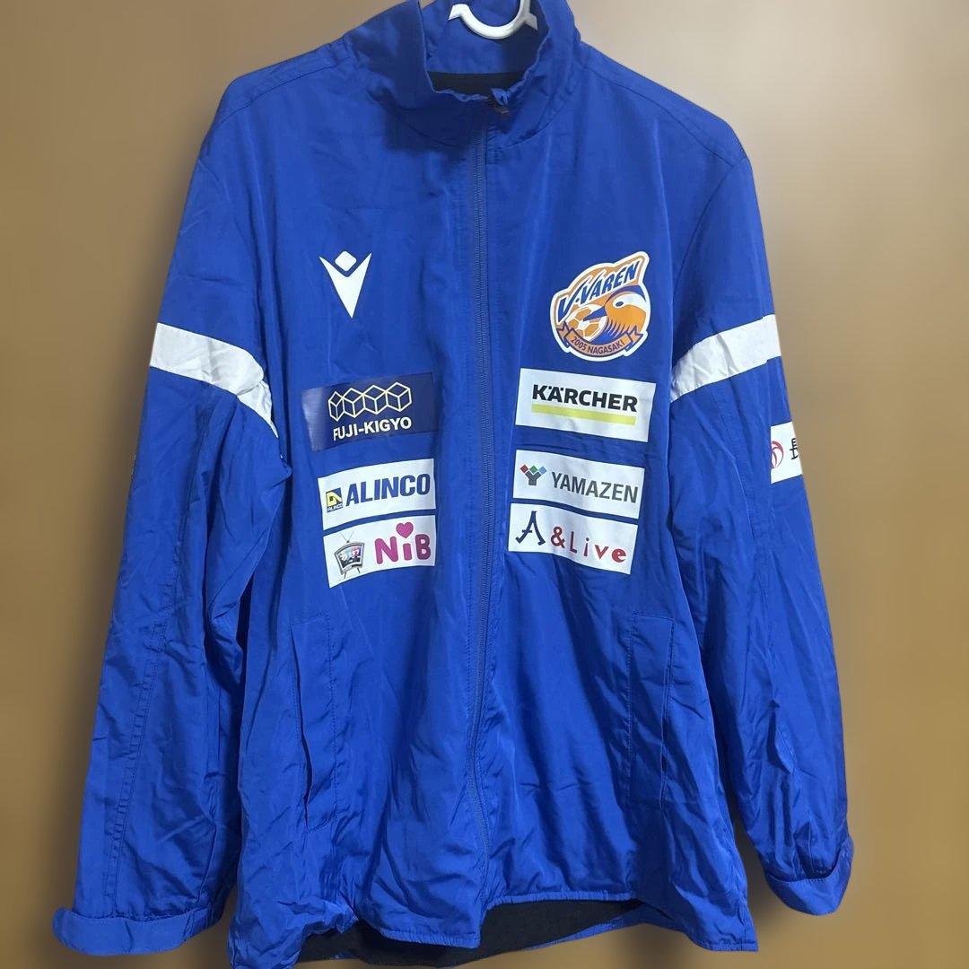 Vファーレン長崎 macron ピステ ウィンドブレーカー M 青