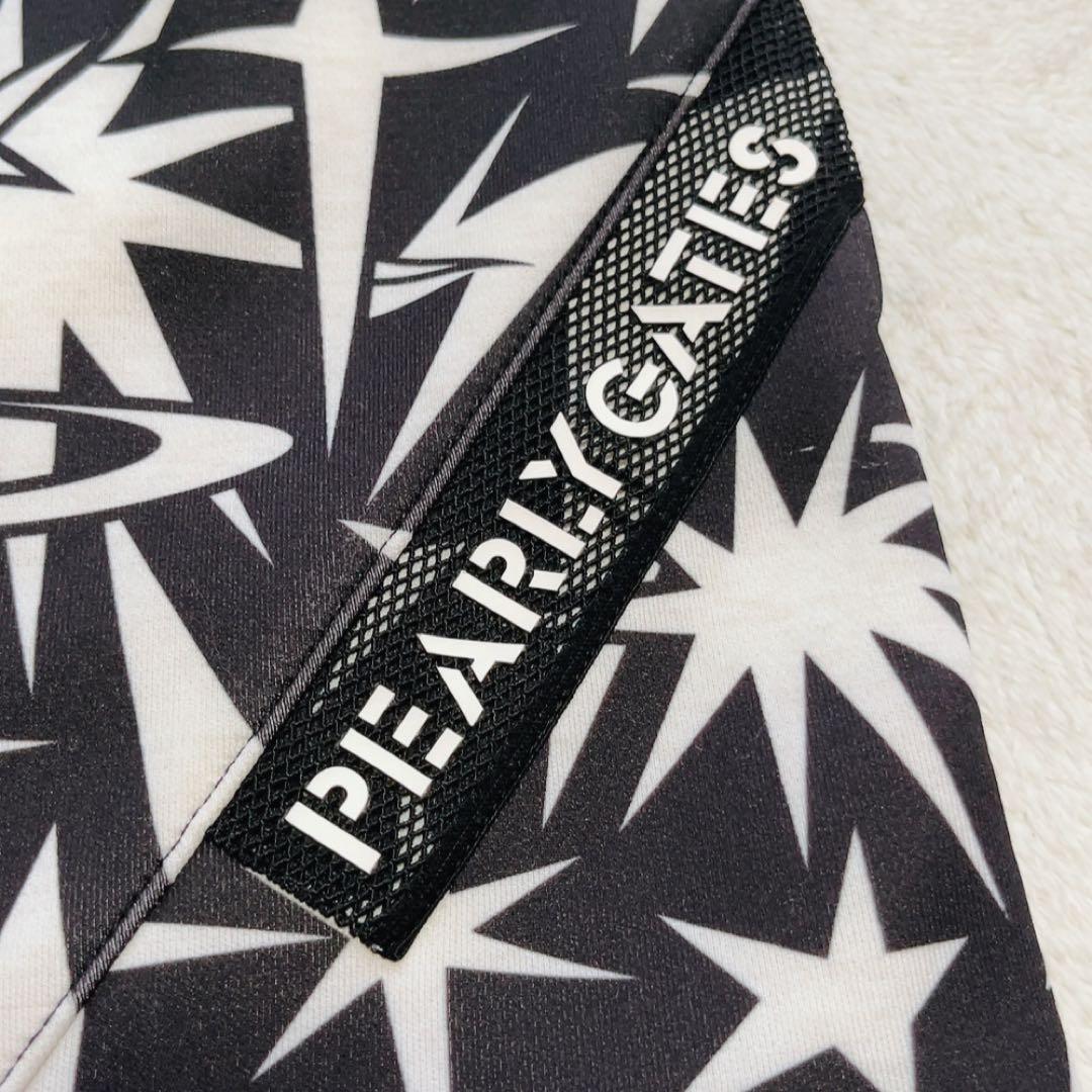 美品 2024 パーリーゲイツ セットアップ ギザ星柄 スカート パーカー L