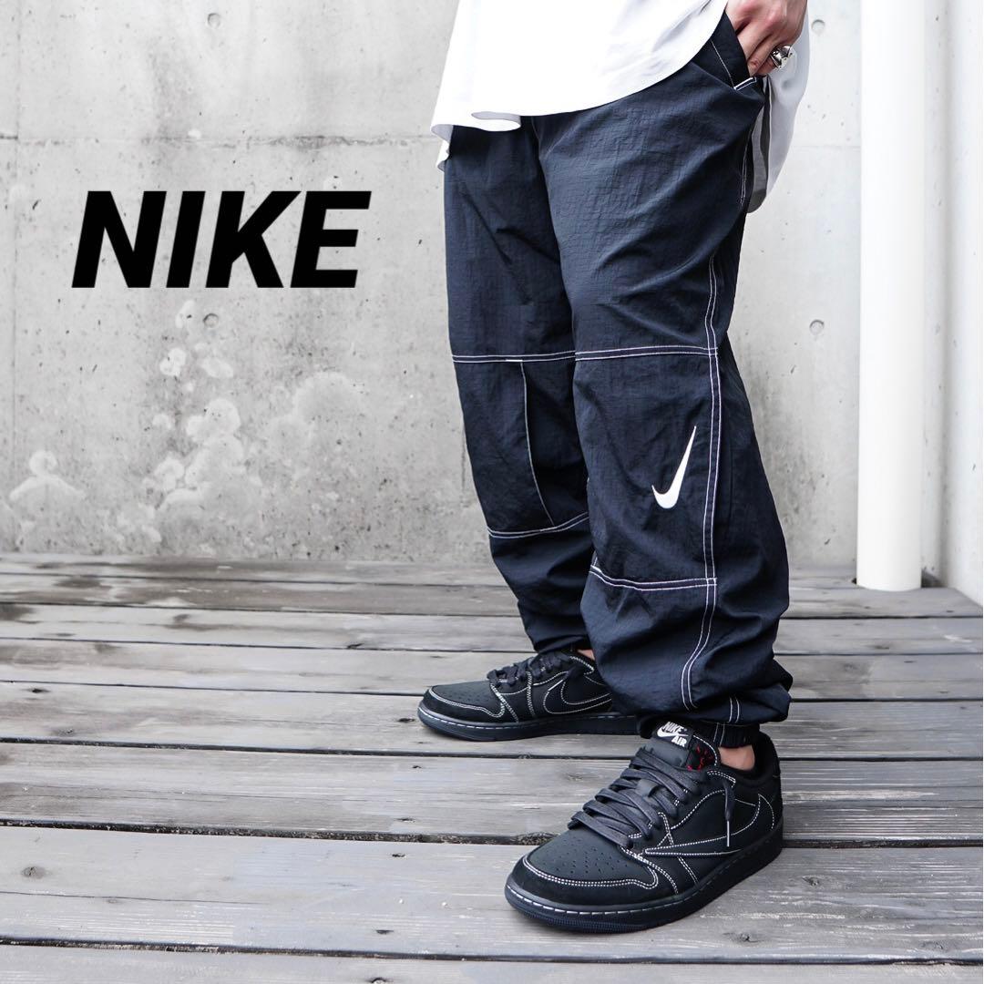 NIKE ナイロンパンツ 白ステッチ 刺繍ロゴ ブラック L - メルカリ
