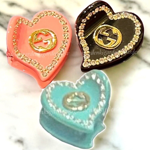 GUCCI ハート型ヘアピン ロッキングG